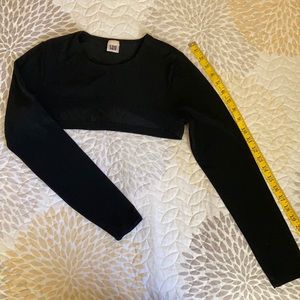 Black Say bolero spandex/polyester blend. Faded tag. Great condition. TLC.